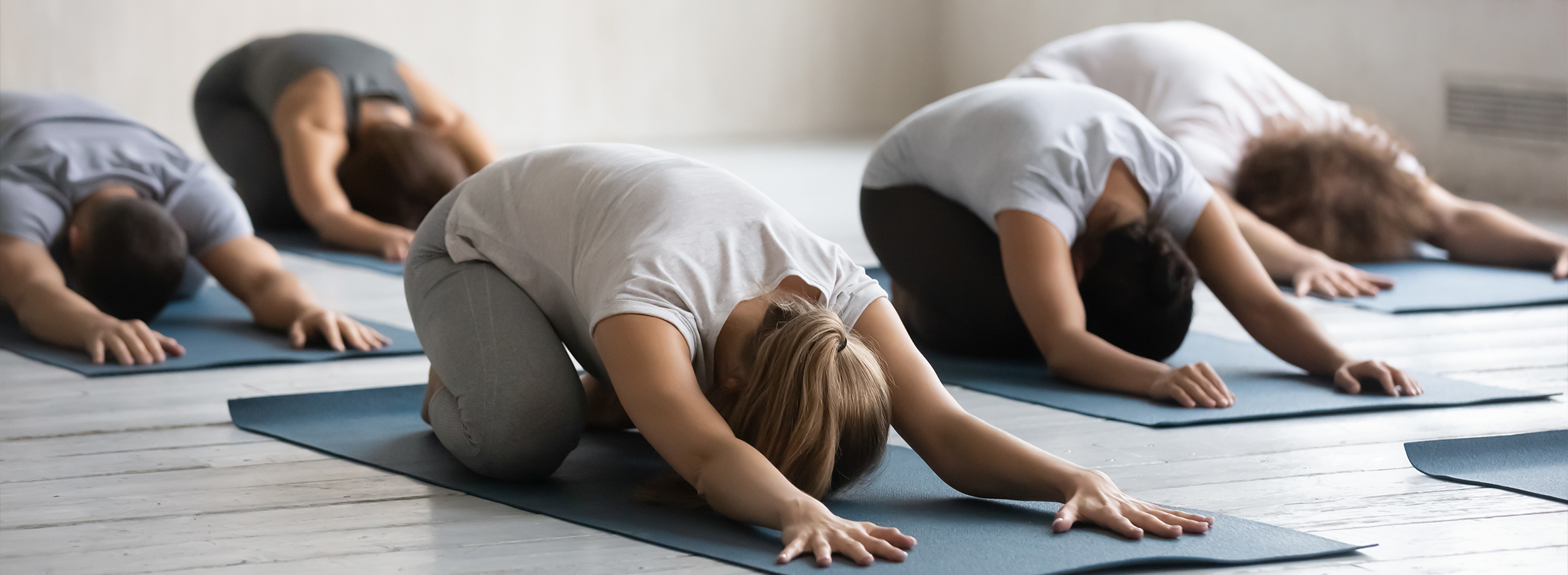 Yoga class synchronised movement